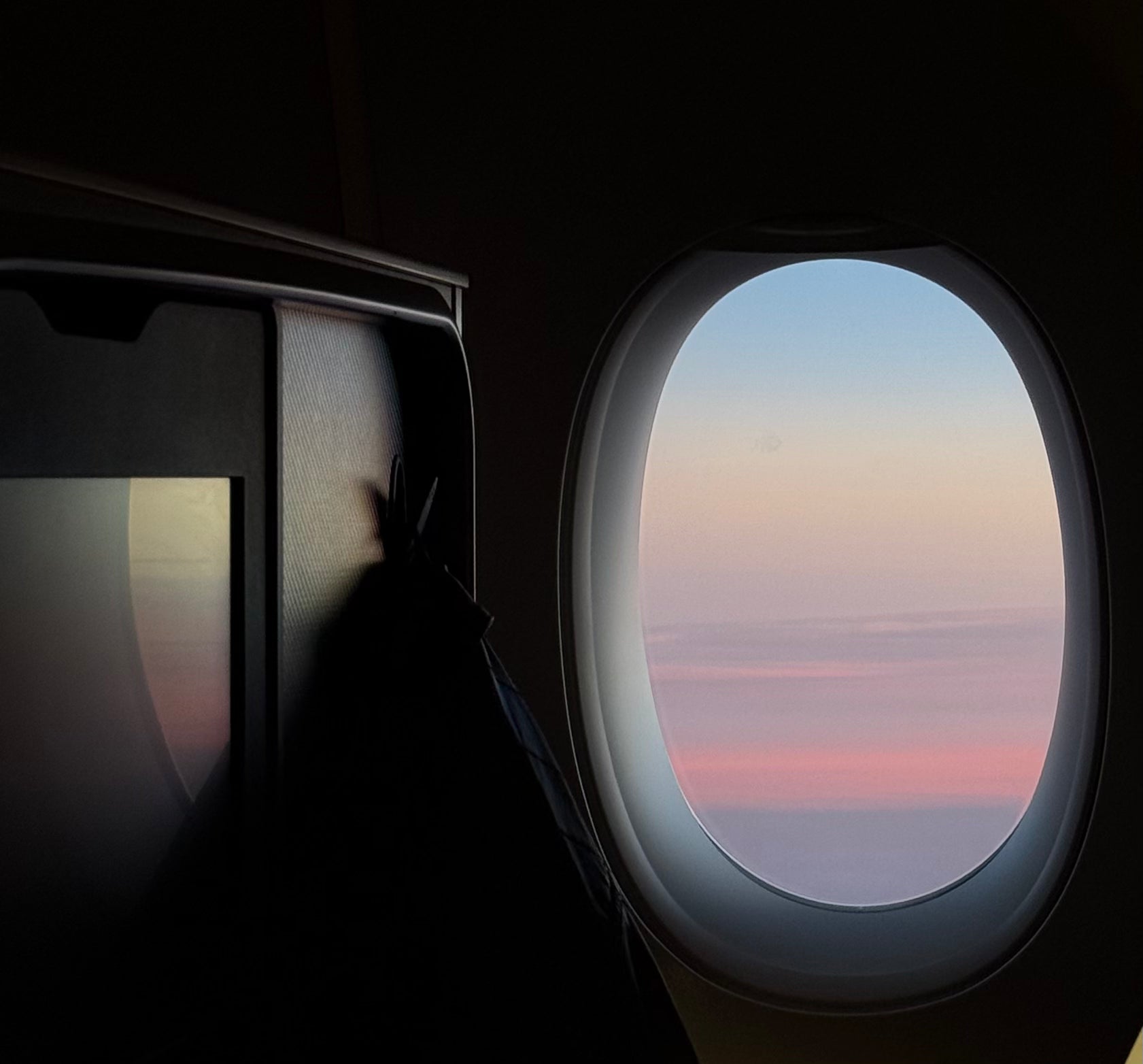 Morning sunrise seen from an aeroplane window
